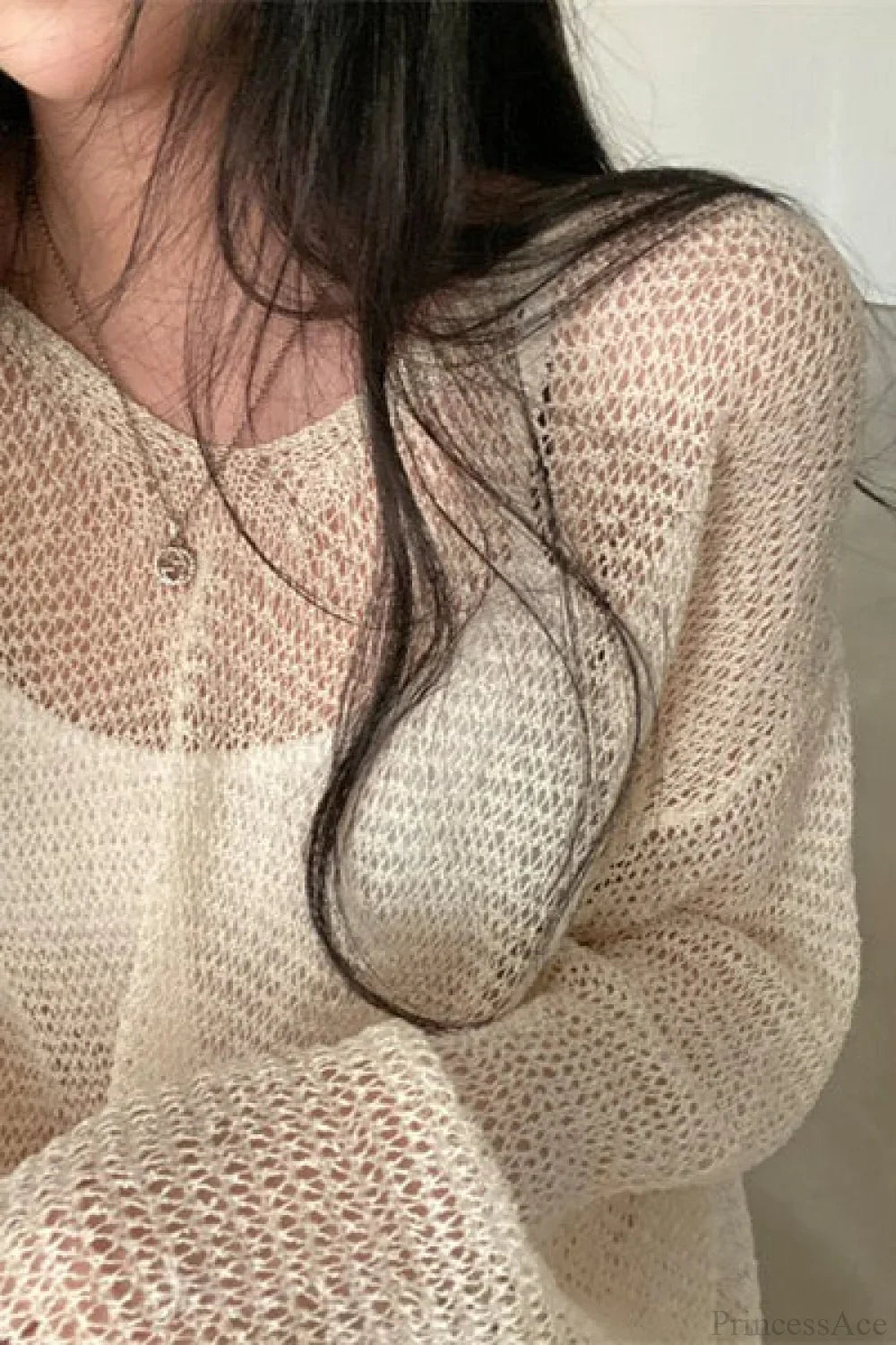 Blusa Chique de Malha com Manga Longa Solta e Trabalhada em Ponto Ajour