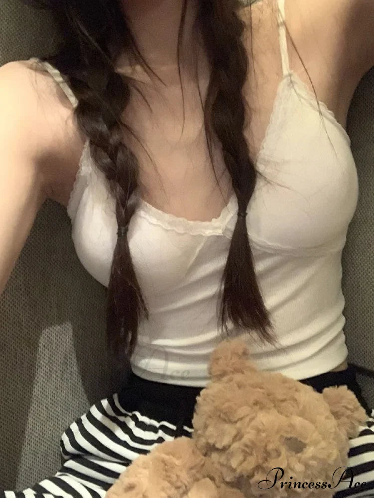 Maglia a maniche lunghe alla moda con pannelli in pizzo e bottoni