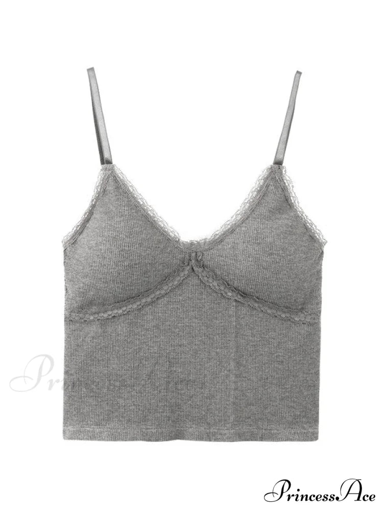 Maglia a maniche lunghe alla moda con pannelli in pizzo e bottoni