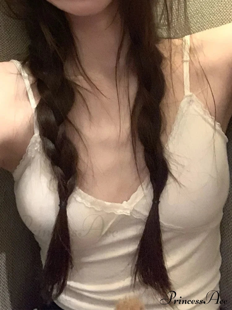 Maglia a maniche lunghe alla moda con pannelli in pizzo e bottoni