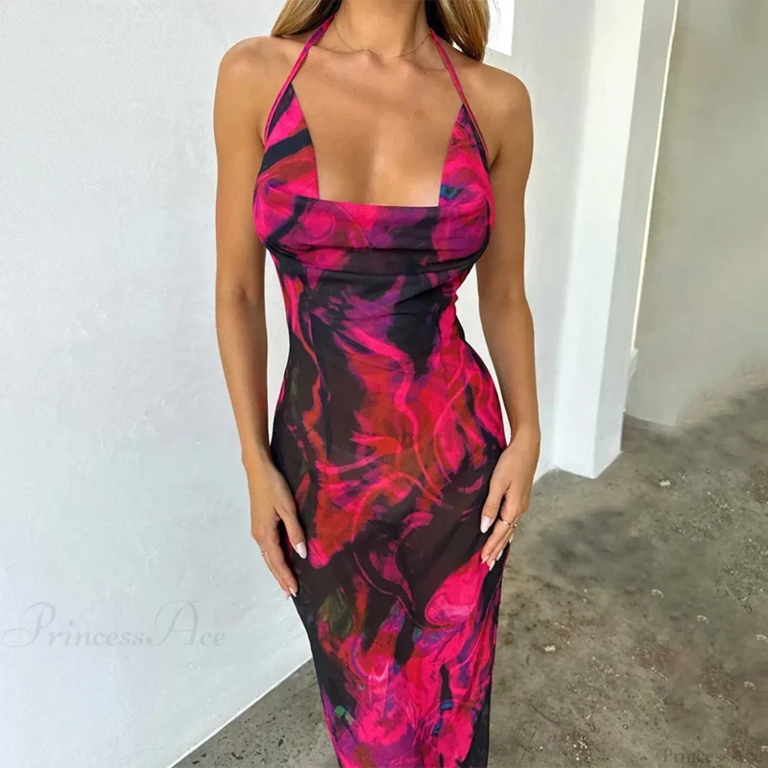 Vestido de Vacaciones Midi con Cuello Halter y Estampado Elegante
