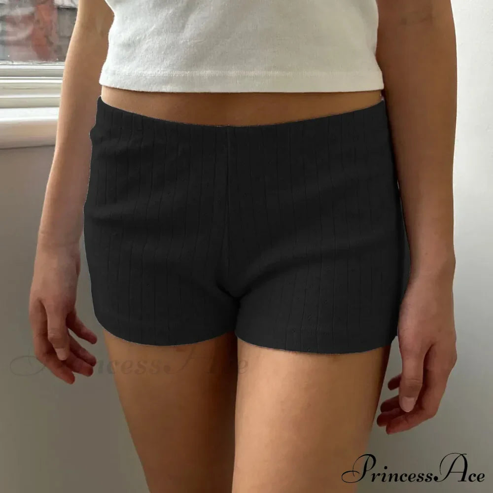 Pigiama corto aderente stile retrò carino con bottoni sul davanti e vita elastica tinta unita