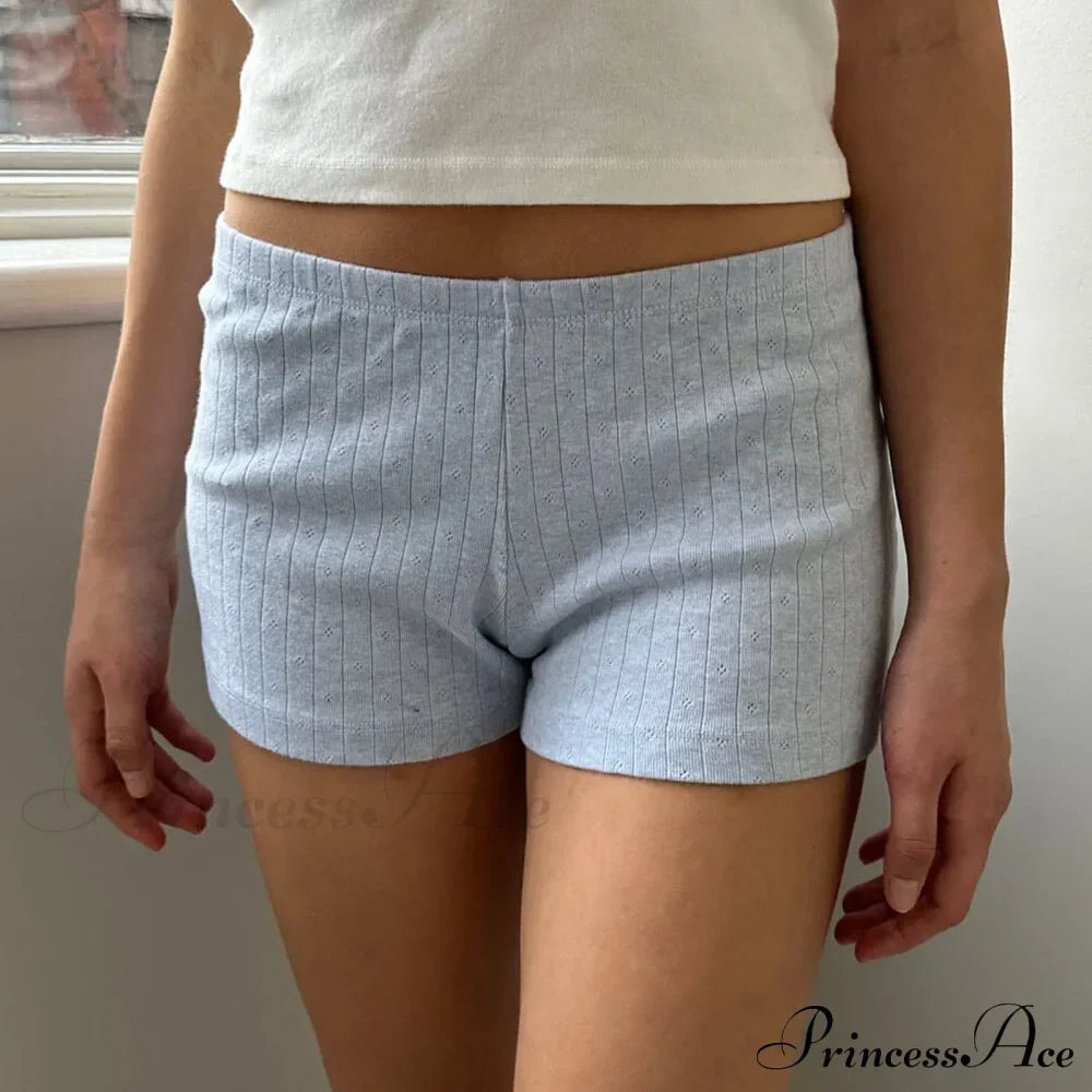 Pigiama corto aderente stile retrò carino con bottoni sul davanti e vita elastica tinta unita