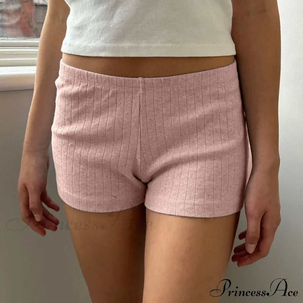 Pigiama corto aderente stile retrò carino con bottoni sul davanti e vita elastica tinta unita