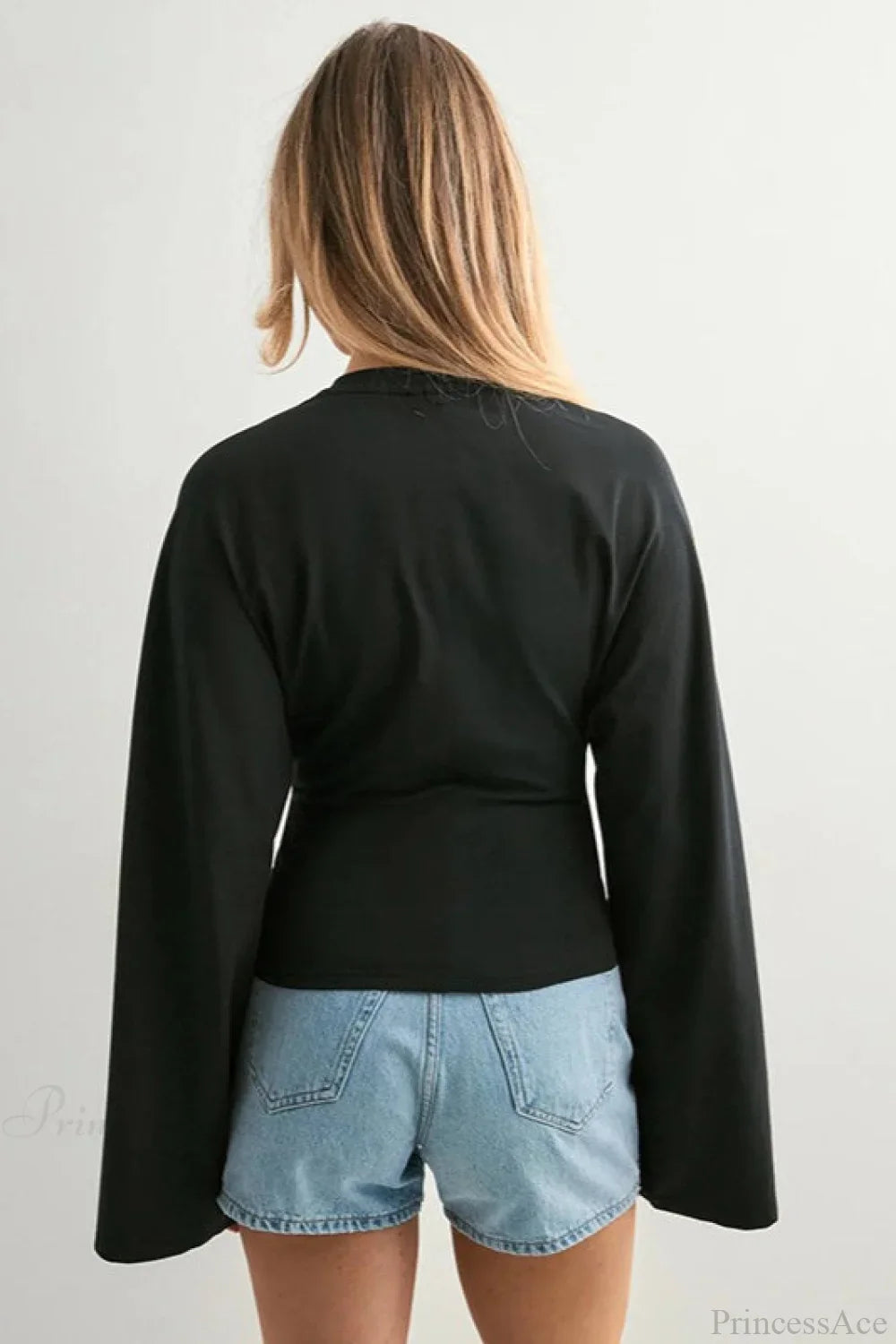 T-shirt à manches longues, col rond uni, manches larges, taille resserrée