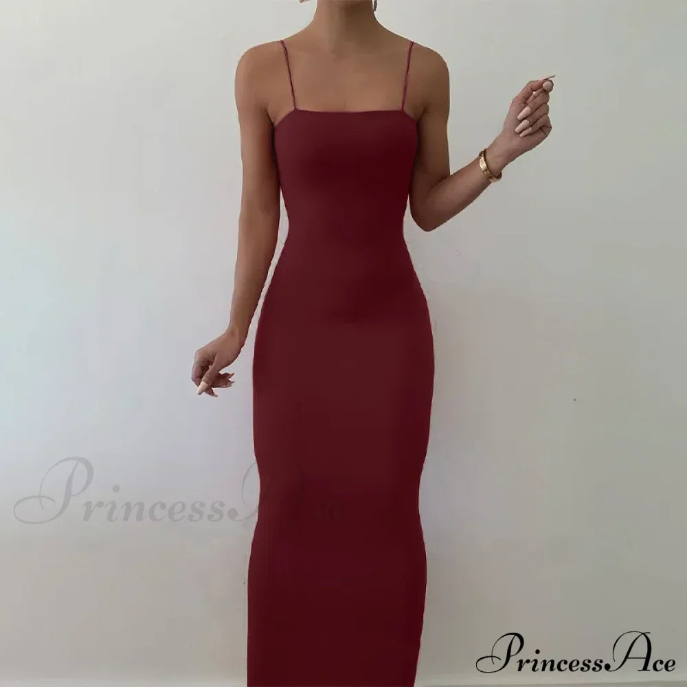 Robe d'été noire élégante, dos nu, fines bretelles, unie, sans manches, ajustée pour soirée