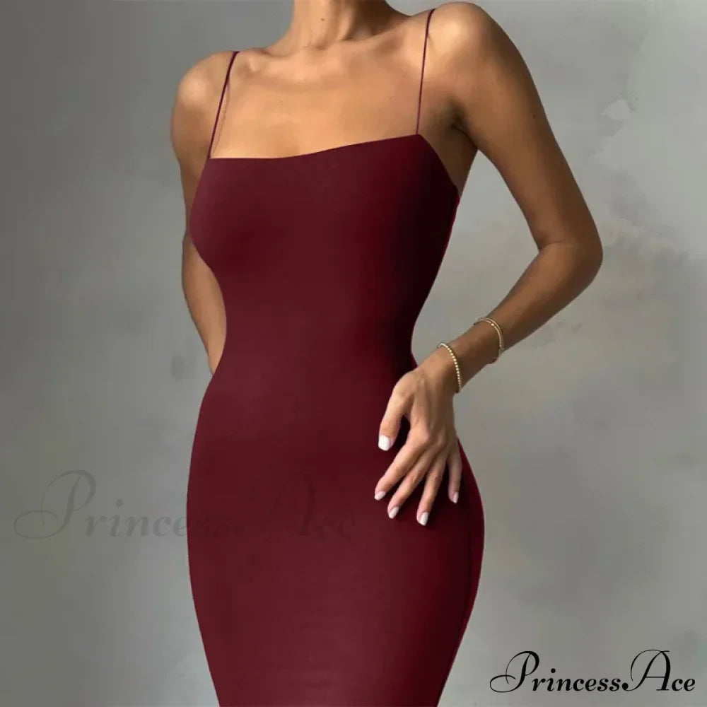 Robe d'été noire élégante, dos nu, fines bretelles, unie, sans manches, ajustée pour soirée