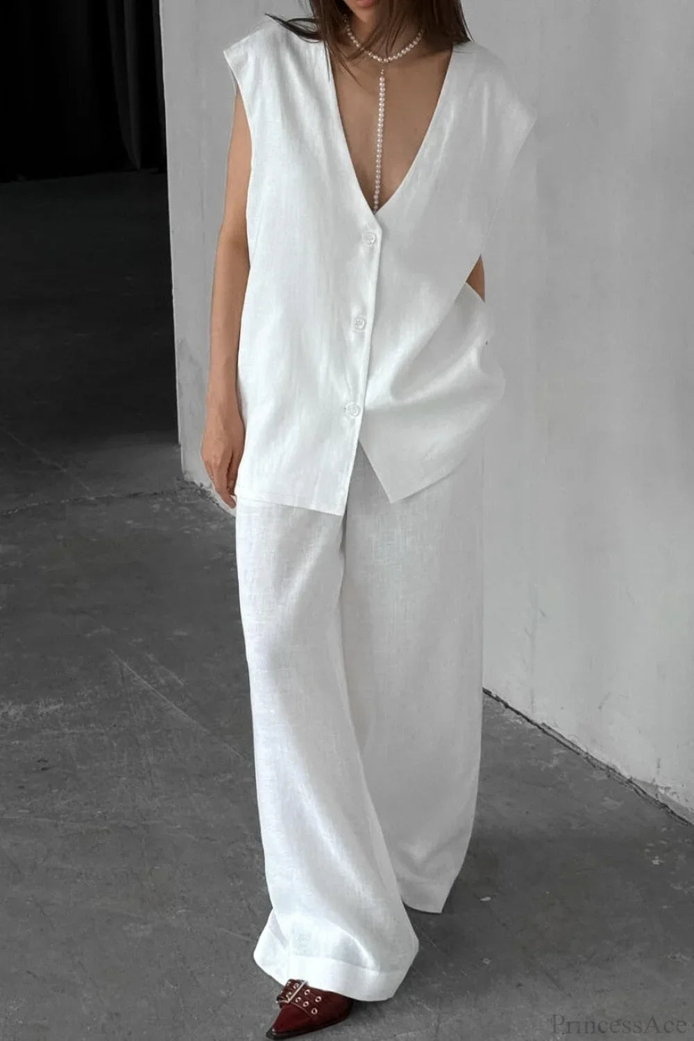 Completo due pezzi con gilet senza maniche in lino di cotone a scollo a V