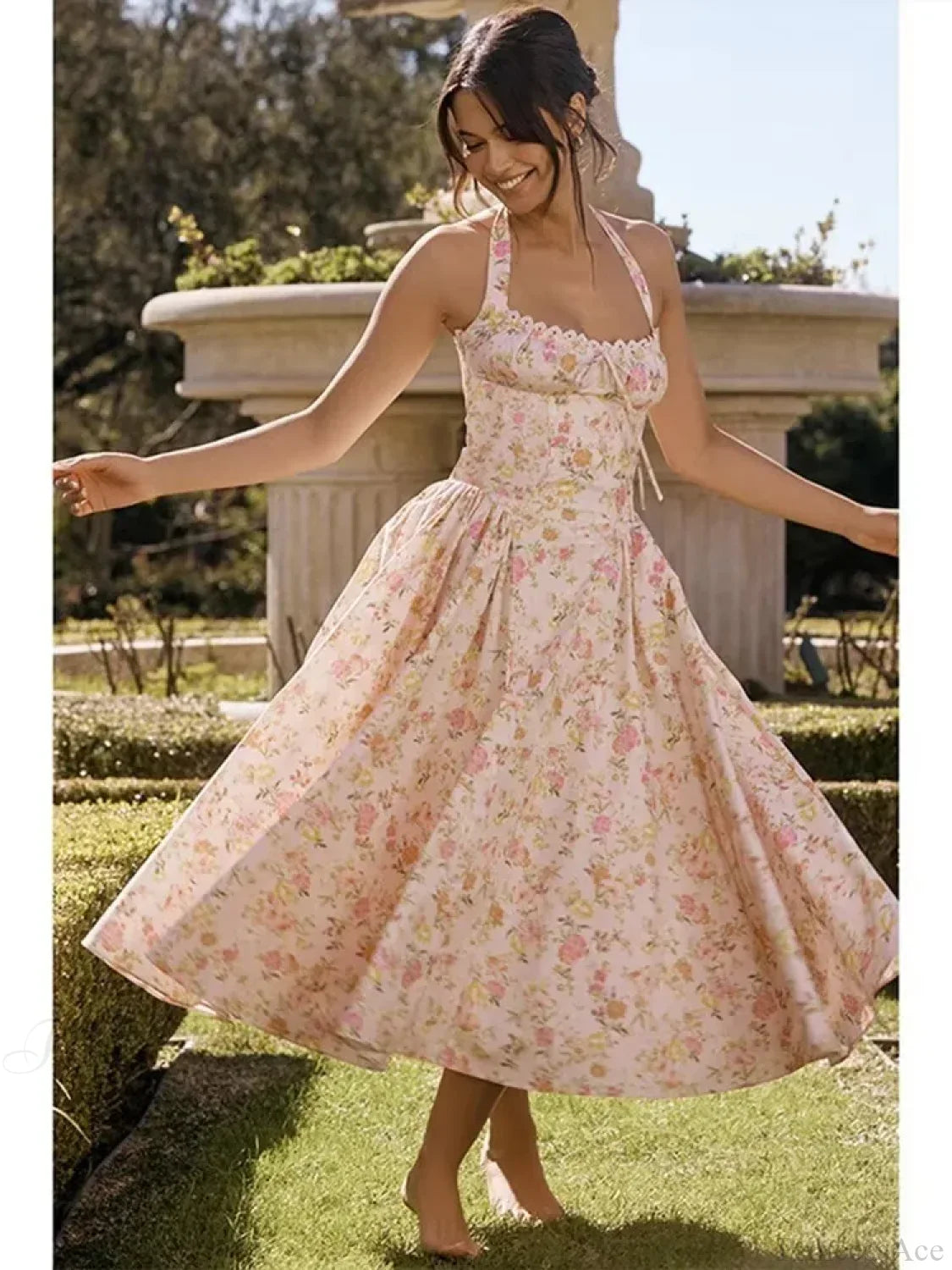 Vestido floral con tirantes finos y cinturón de cintura