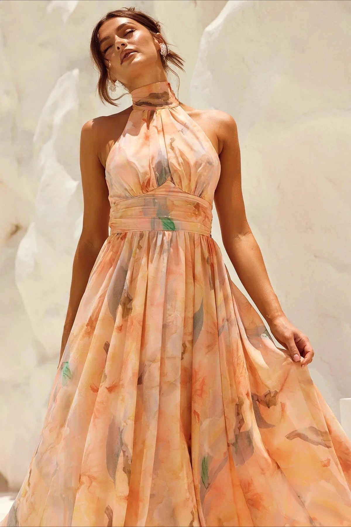 Ärmelloses Midikleid mit Blumenmuster, Neckholder und rückenfreiem Schnitt