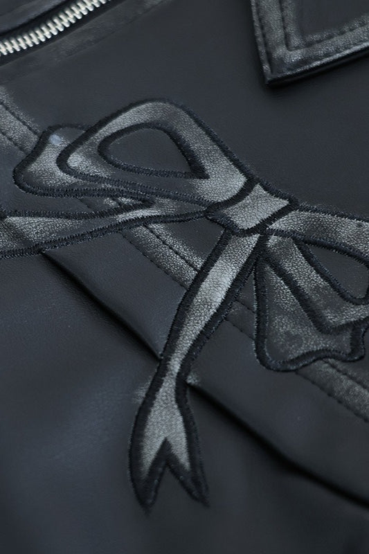 Chaqueta motera de cuero sintético con lazo decorativo