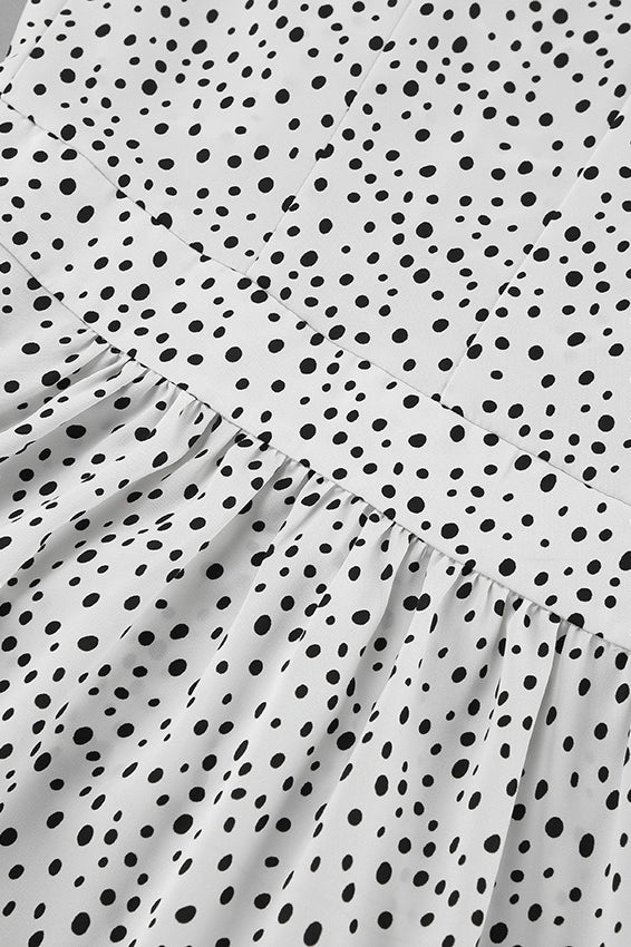 Robe longue à pois et fleurs avec col en V et manches bouffantes