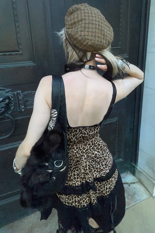 Modische asymmetrische Spitzenbluse mit Leopardenmuster