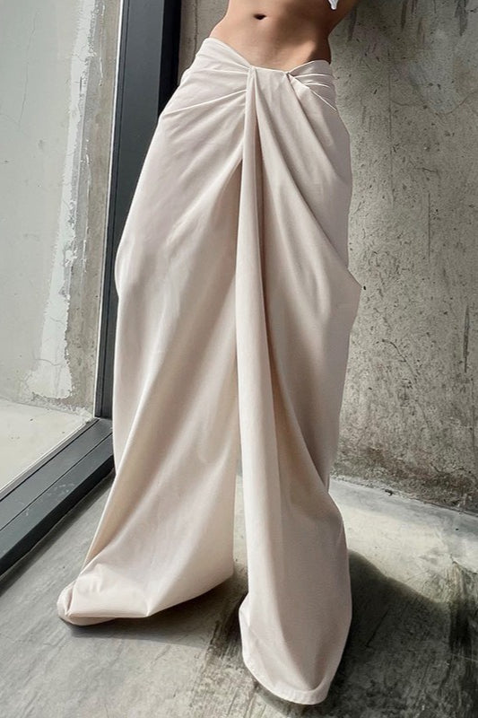 Pantalones anchos de pierna recta con giro asimétrico sólido