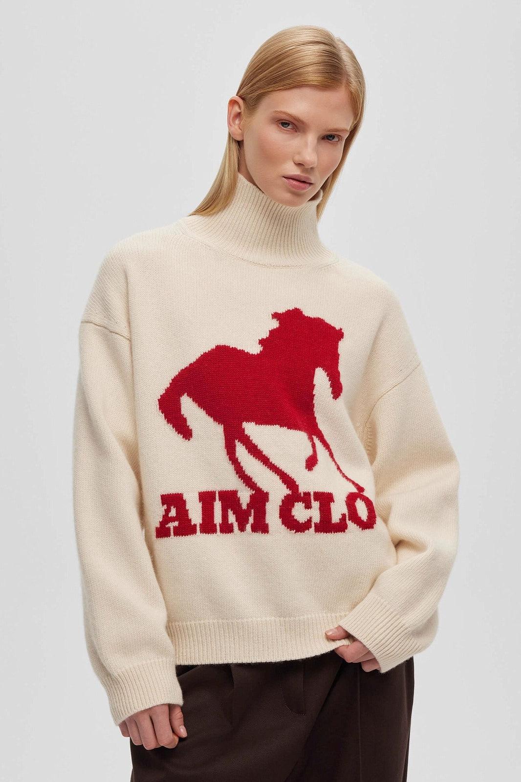 Felpa a collo alto con motivo animale a blocchi di colore