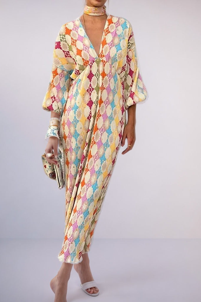 Vestido bohemio elegante con escote en V y mangas farol con motivos florales