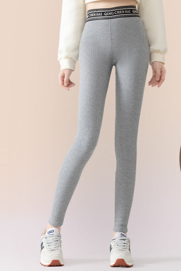 Leggings ajustados de algodón acanalado con forro de vellón hasta el tobillo