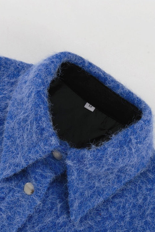 Giacca blu di lana a maniche lunghe