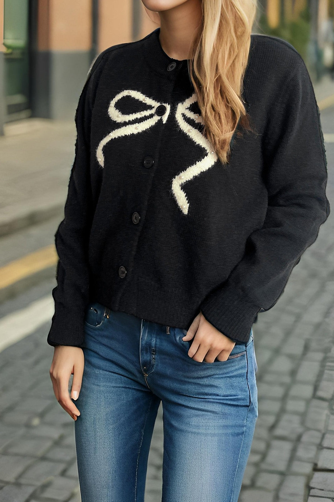 Cárdigan redondo de jacquard con lazo sólido