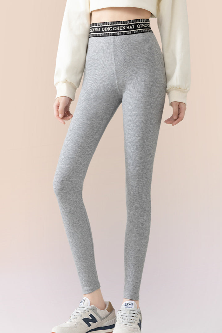 Leggings ajustados de algodón acanalado con forro de vellón hasta el tobillo