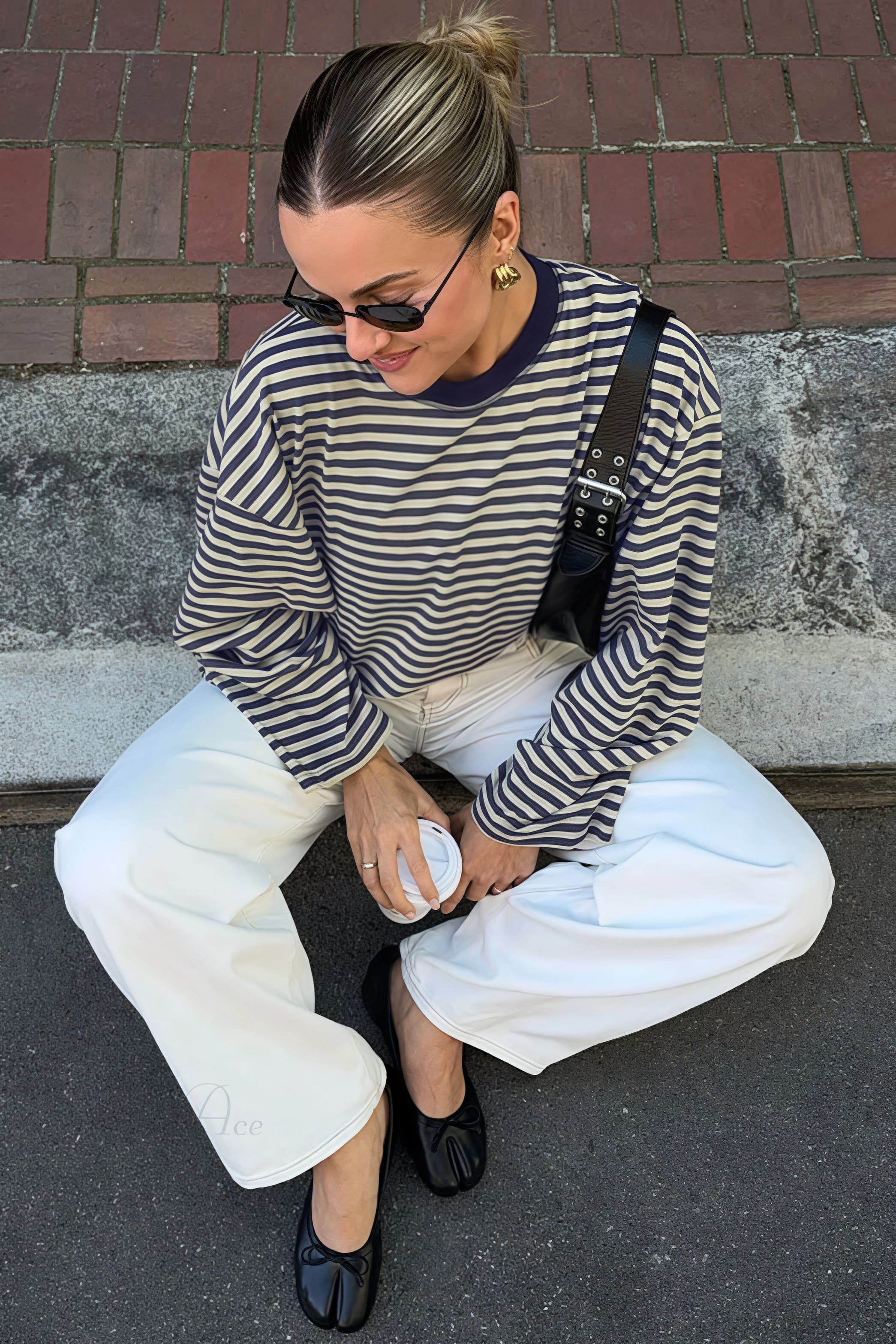 Camiseta holgada de manga larga con cuello redondo y bloques de color a rayas