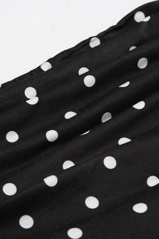 Top corto a spalle scoperte con blocchi di colore a pois