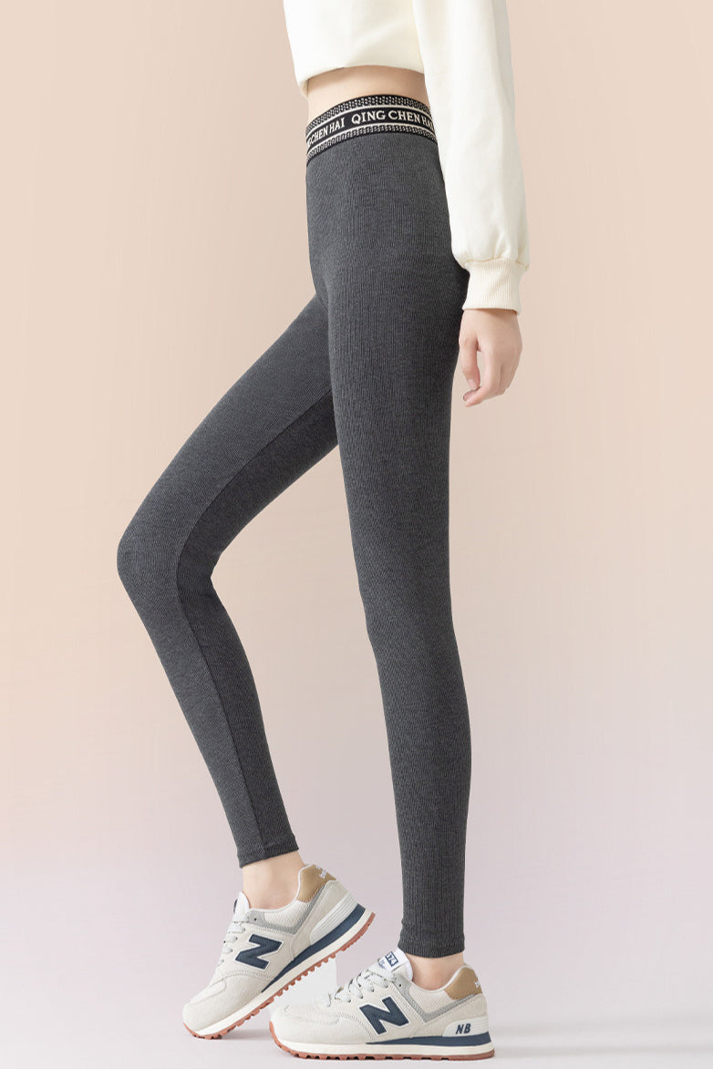 Leggings ajustados de algodón acanalado con forro de vellón hasta el tobillo