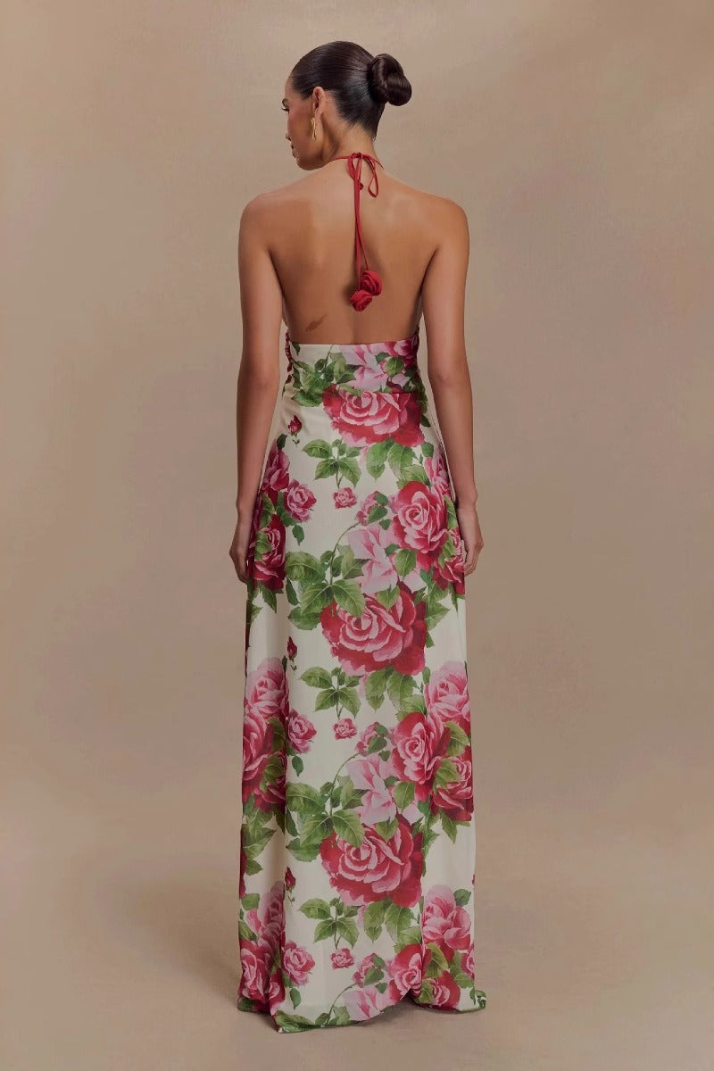 Abito floreale rosa con spalle scoperte e collo halter