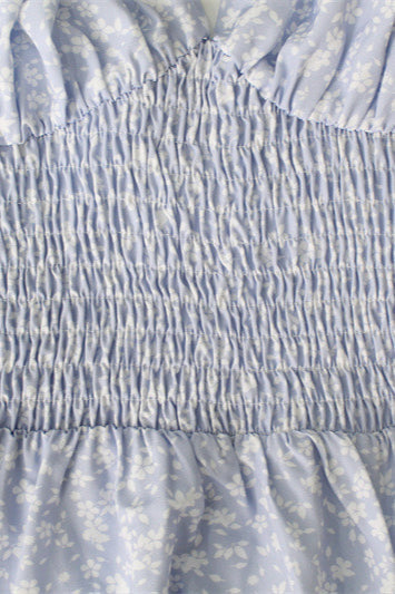 Vestido largo floral con tirantes finos y volantes