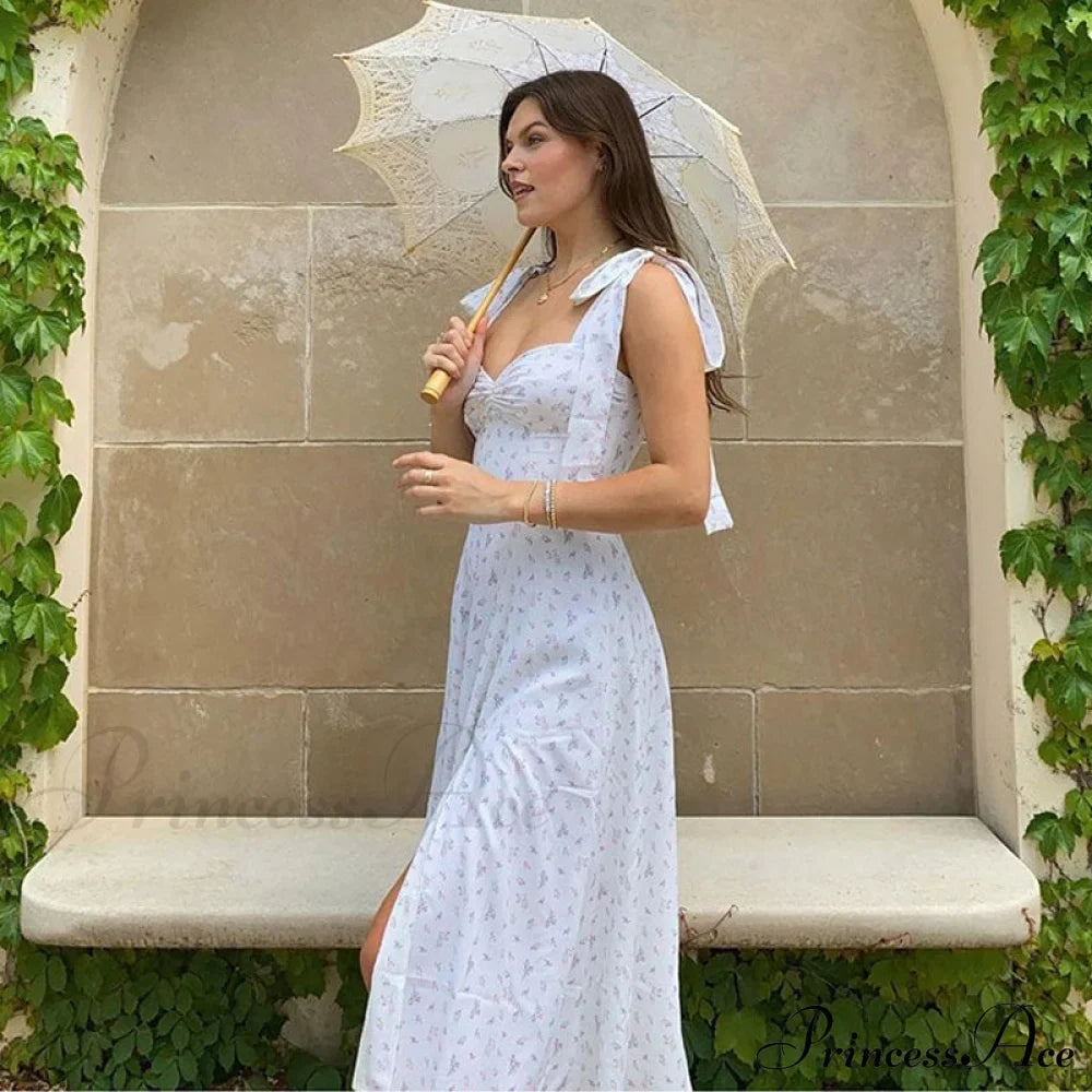 Tutina corta a maniche lunghe con scollo quadrato attivo, classica a coste, bianca