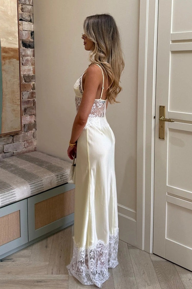 Elegantes sexy Maxikleid mit tiefem V-Ausschnitt und durchscheinender Spitzenmusterung