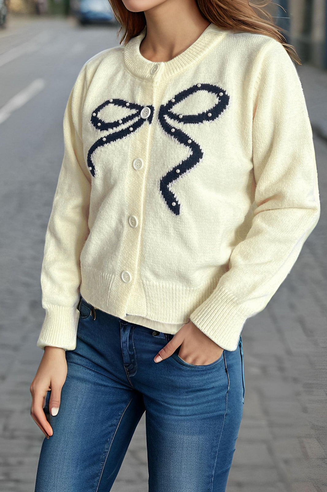 Cárdigan redondo de jacquard con lazo sólido