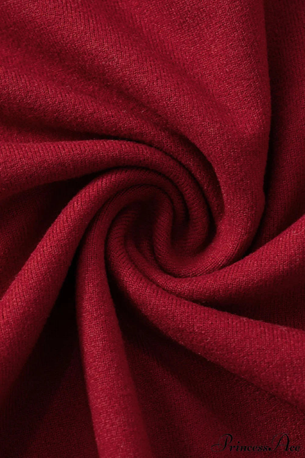 Top corto de manga larga con hombros descubiertos y lazo en el cuello