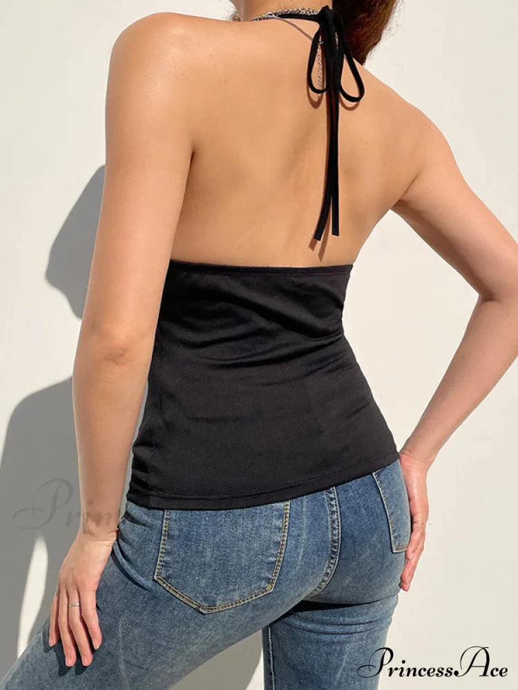 Top corto aderente alla moda con cinturino e fibbia nero