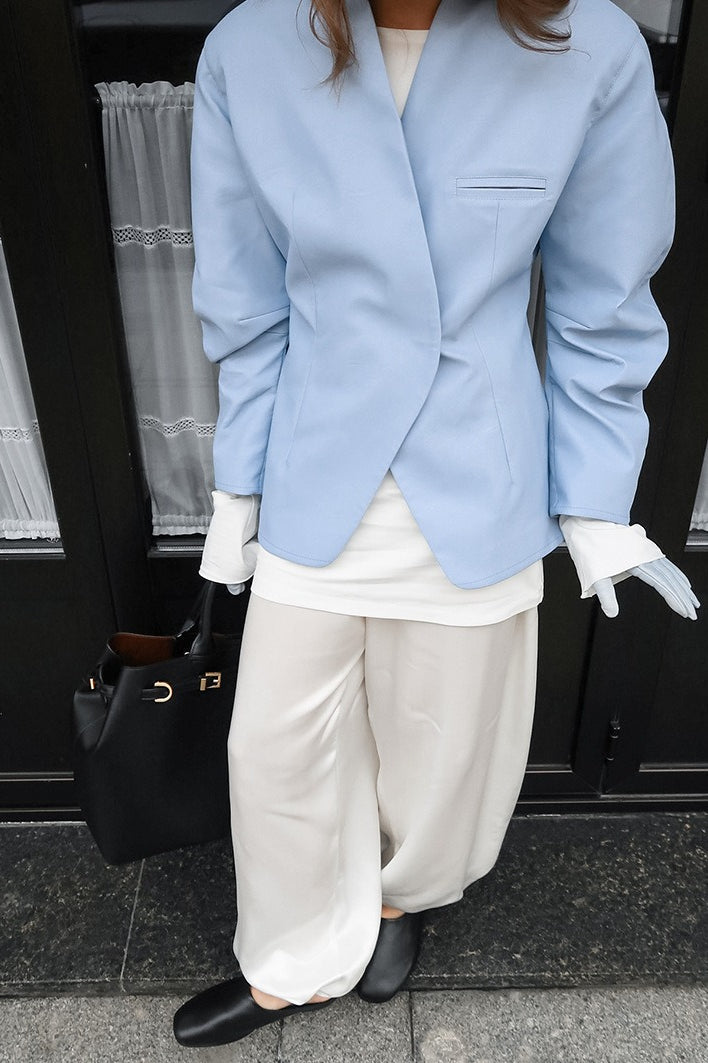 Blazer azul informal suelto de manga larga