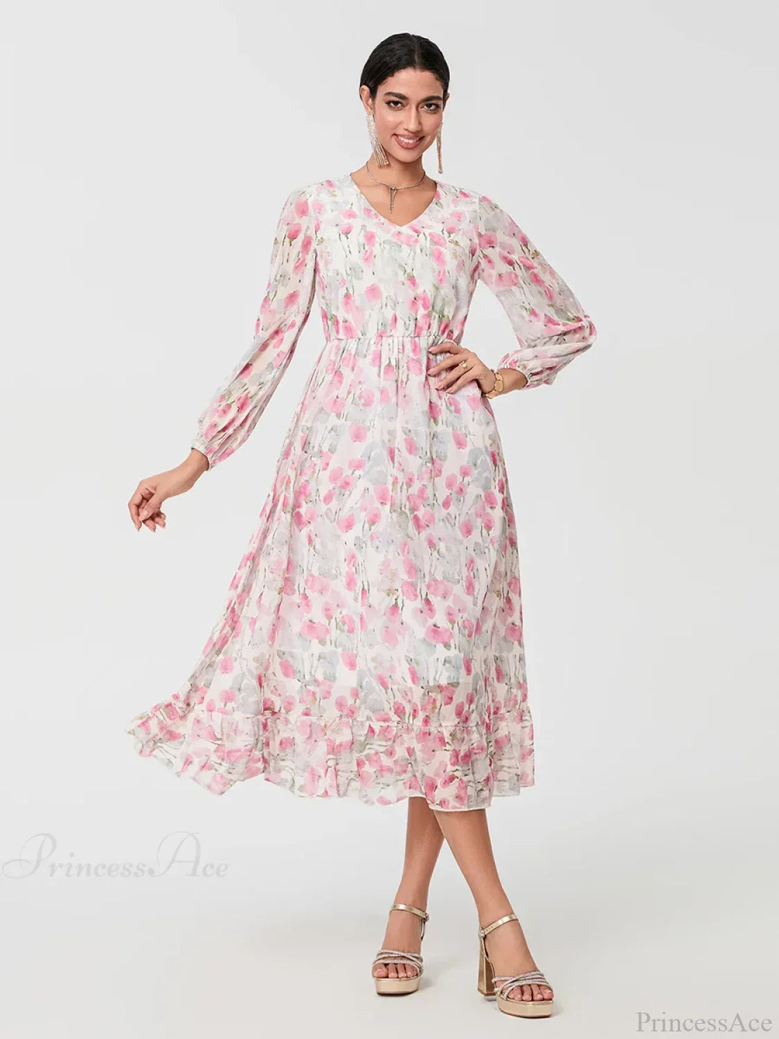 Vestido floral elegante de manga larga fluida en línea A