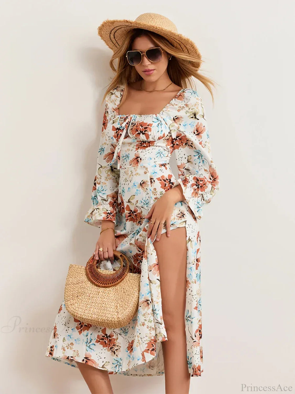 Vestido floral elegante midi con mangas abullonadas y escote cuadrado