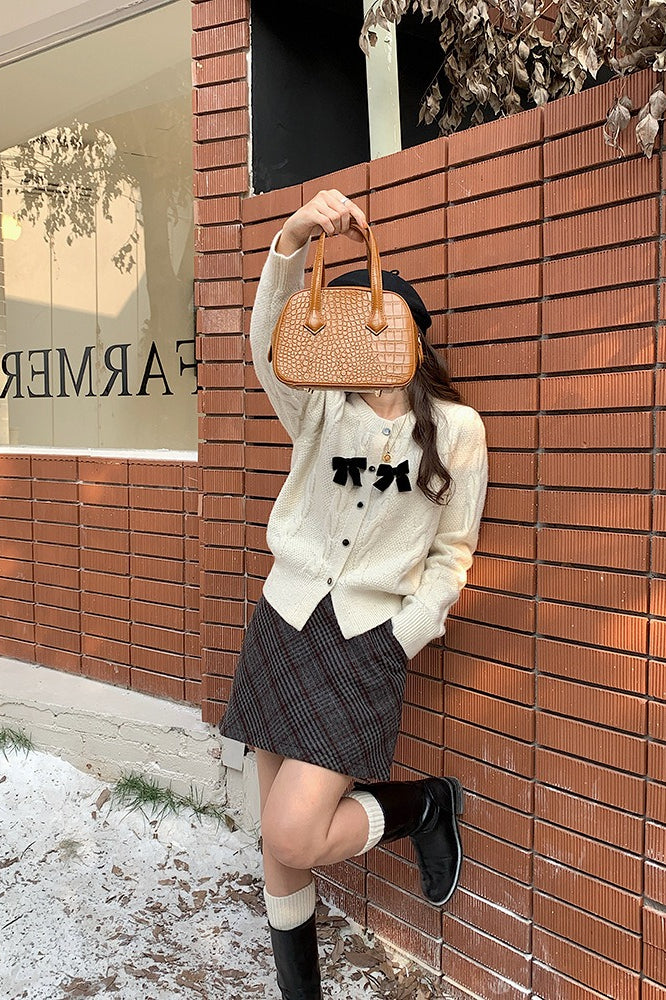 Cardigan a coste con fiocco scintillante