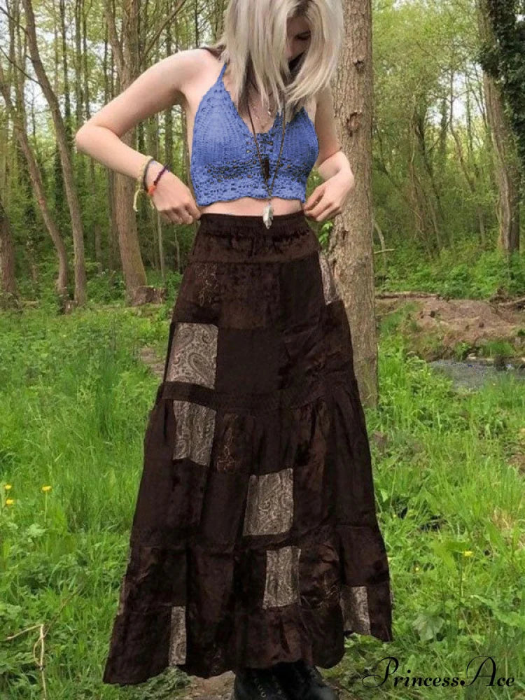 Top corti alla moda traforati all'uncinetto con collo a fascia