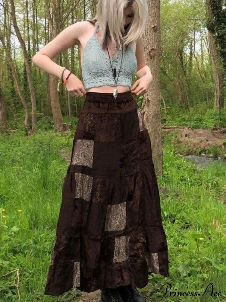 Top corti alla moda traforati all'uncinetto con collo a fascia