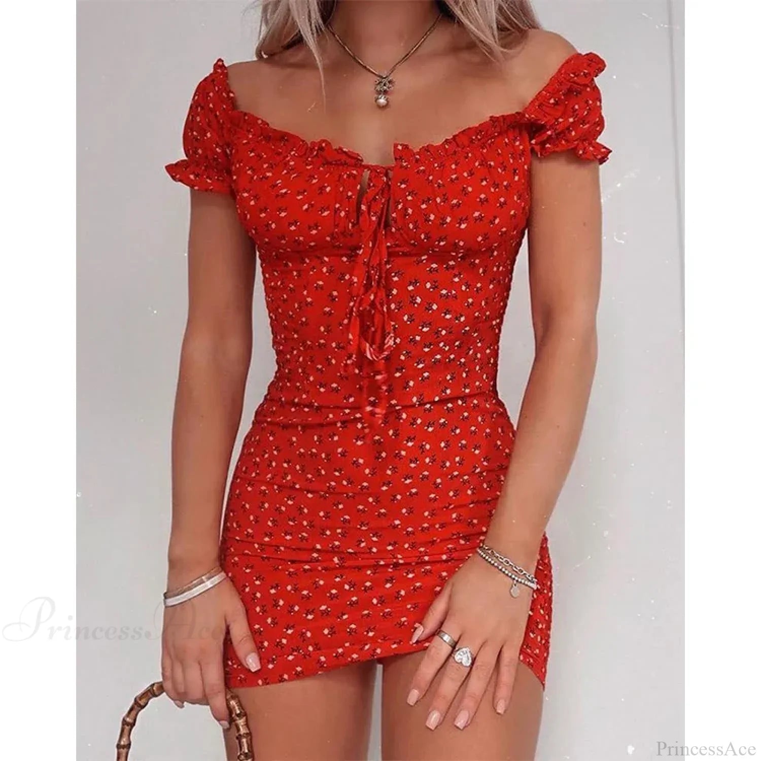 Schulterfreies Kleid mit Blumenmuster, Rüschen und Bindeband