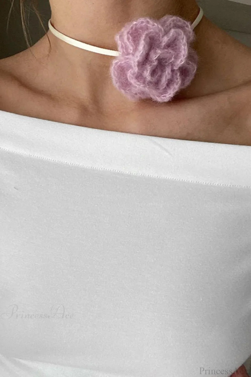 Maglietta aderente a maniche lunghe con scollo a barca e dettaglio annodato