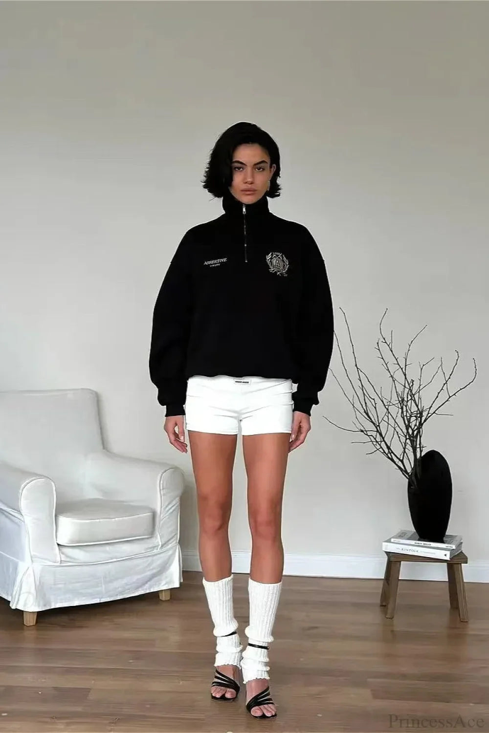 Felpa con collo alto a mezza cerniera, foderata in pile, dal taglio comodo e trasformabile