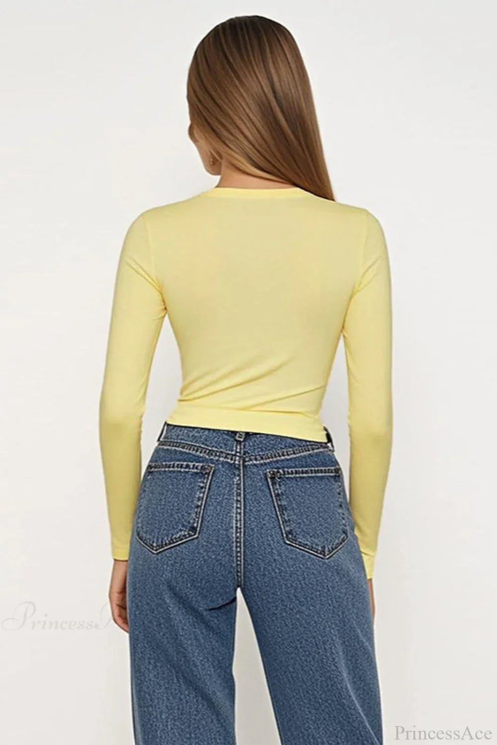 Jednoduché tričko s dlouhým rukávem a knoflíkovým detailem