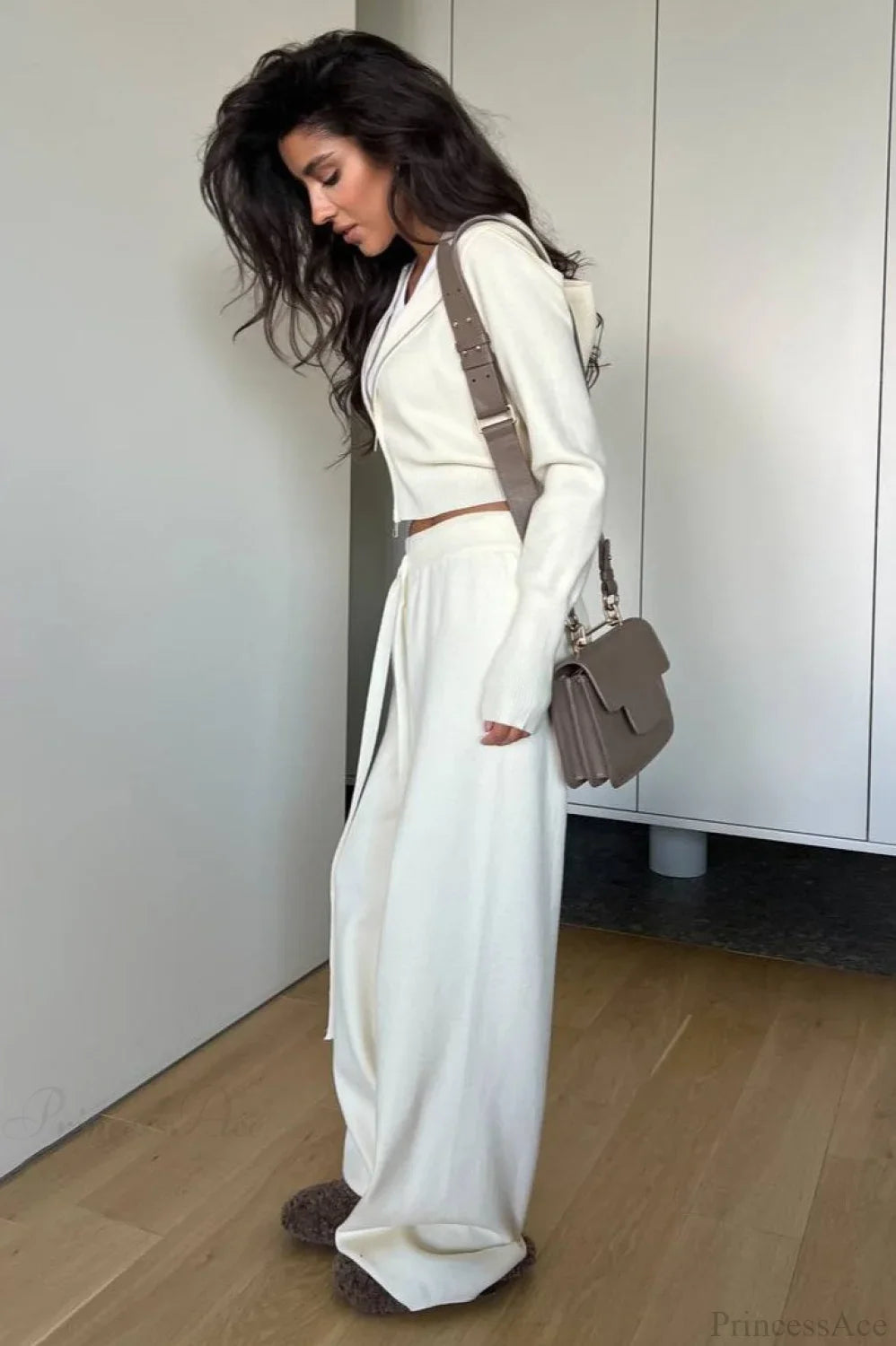 Conjunto de dos piezas: chaqueta corta de punto sólido con cremallera y pantalones holgados