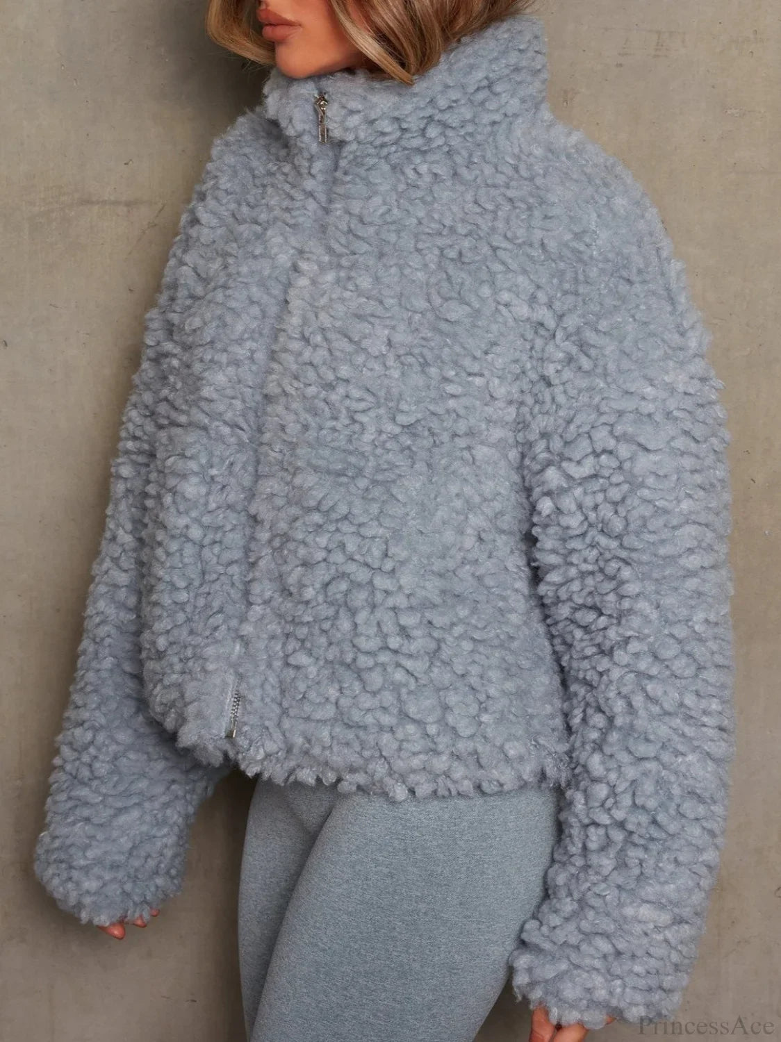 Manteau court en sherpa duveteux minimaliste uni