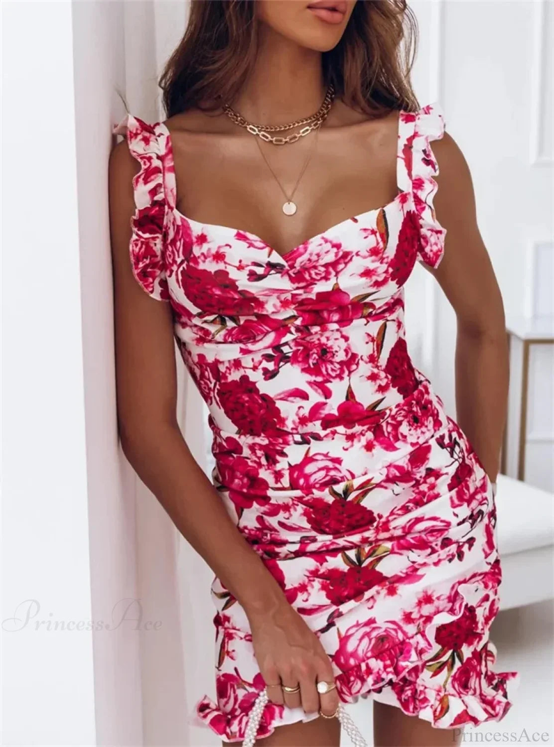 Vestido floral ajustado sin mangas con volantes y escote en V