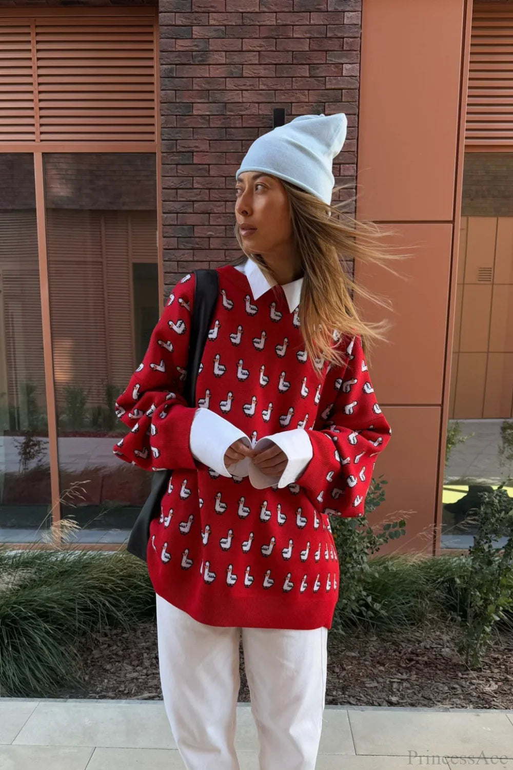 Blusa lavorata a maglia rossa con motivo jacquard a blocchi di colore versatile