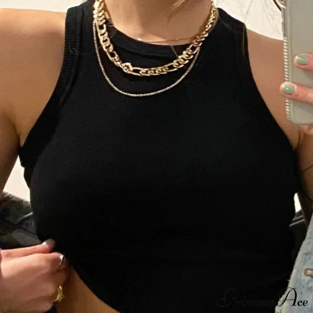 Haut court tricoté à bretelles tombantes aux couleurs bonbon